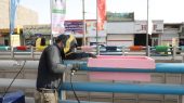 بازآفرینی بصری عرشه پل زیرگذر امام رضا (ع) با نصب گلدان‌های جدید